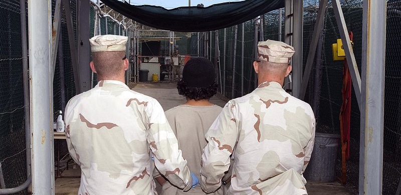 800px-Captive_being_escorted_for_medical_care,_December_2007